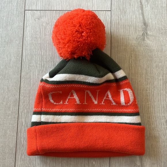 NWOT AUTHENTIC CANADA GOOSE 100% MERINO WOOL SKI BEANIE CLASSIC STYLE ORANGE/WHT - Picture 10 of 10